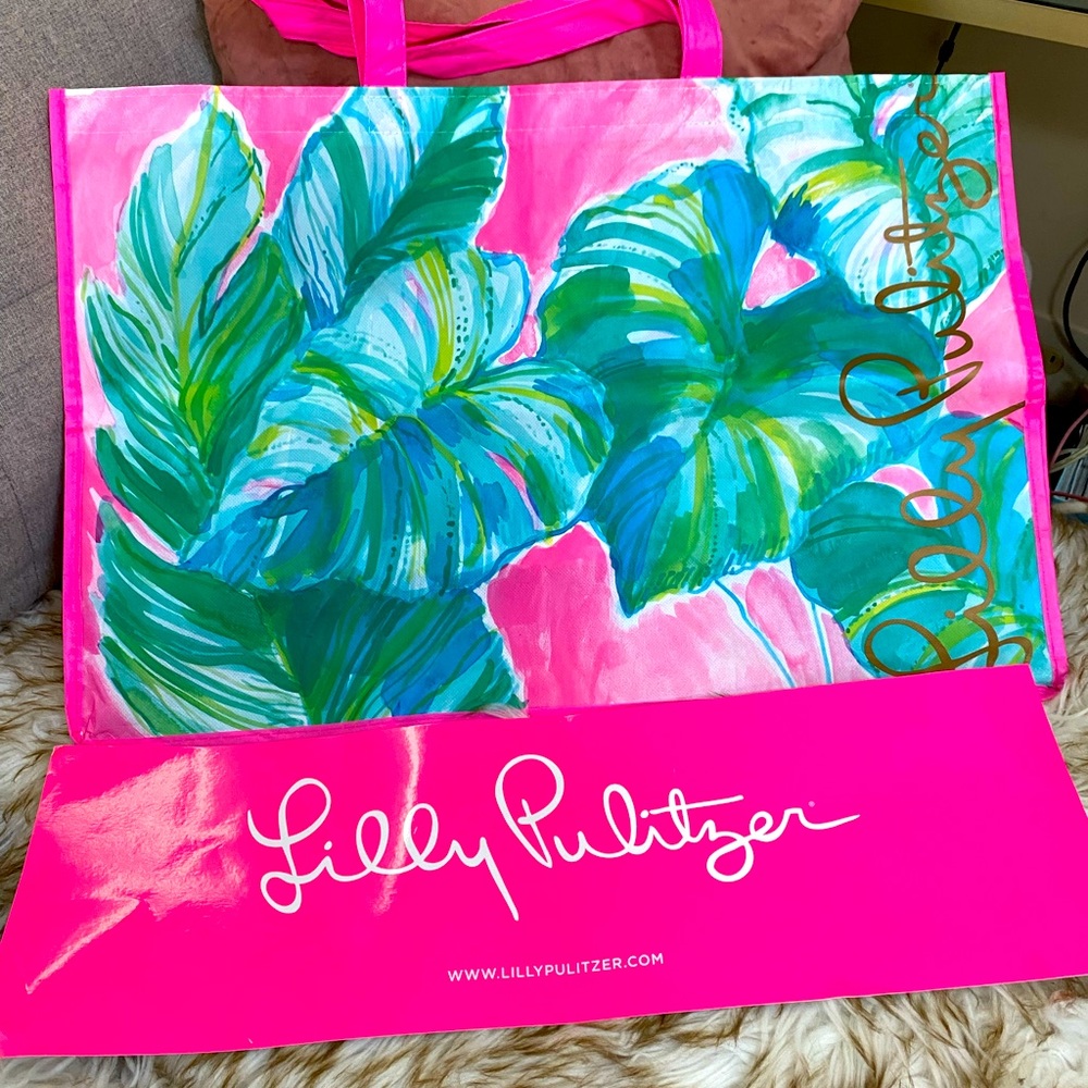Lilly Pulitzer Vinyl Tote Bag. NWOT 
1 Giant reusable Lilly Pulitzer tote bag